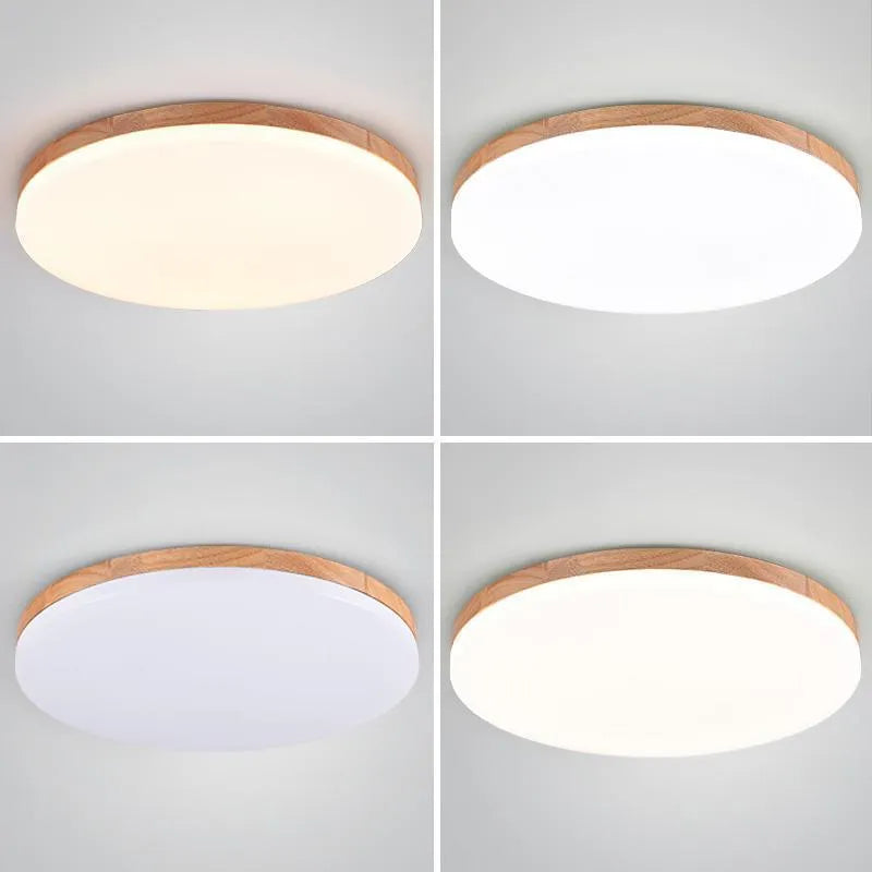 Japanese minimalist ceiling lamp with a wood art body and white acrylic shade in three available diameters.