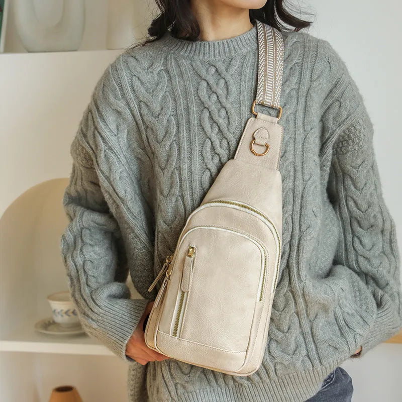 Women's soft PU leather crossbody messenger bag in street trend style with sewing thread details.