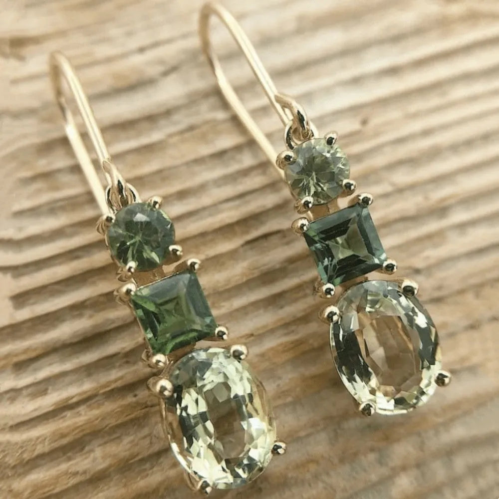 A pair of green copper geometric earrings with a quadrilateral shape and retro bohemian style.