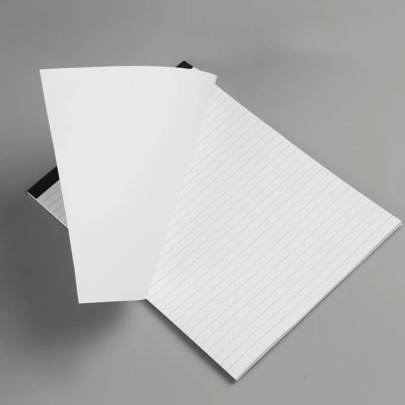 A4 tearable notebook with grid paper and wireless adhesive binding, shown in ivory white.