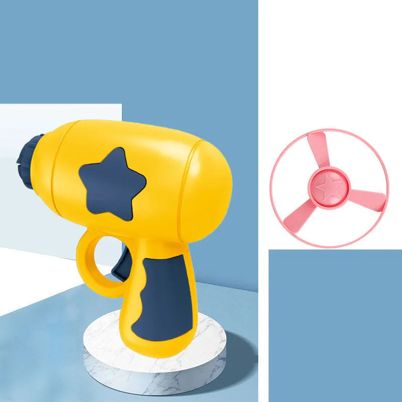 LED light-up flying saucer toy set with launcher gun, three glowing discs, and target board.