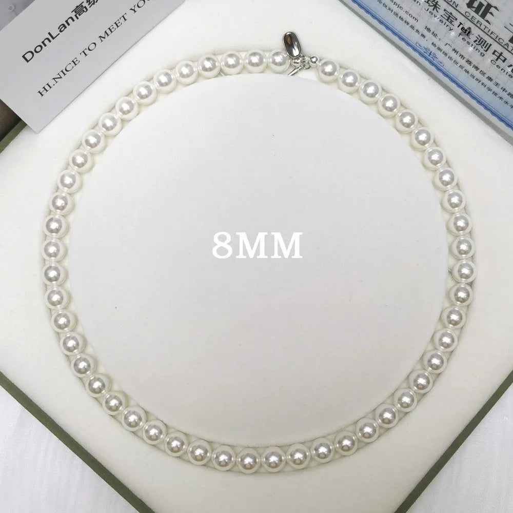 925 silver ingot buckle necklace with Australian white shell pearls on a model, unisex clavicle chain style