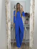 A loose-fitting black two-piece lounge set consisting of a long-sleeve round-neck top and matching trousers.