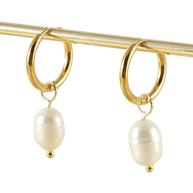 Gold geometric pearl earrings made from stainless steel with titanium steel components