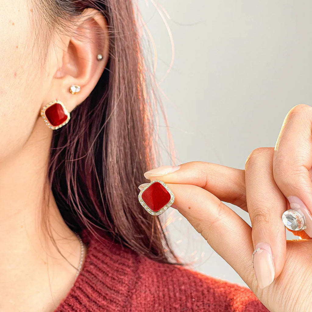 Red square geometric earrings with inlaid design on alloy base