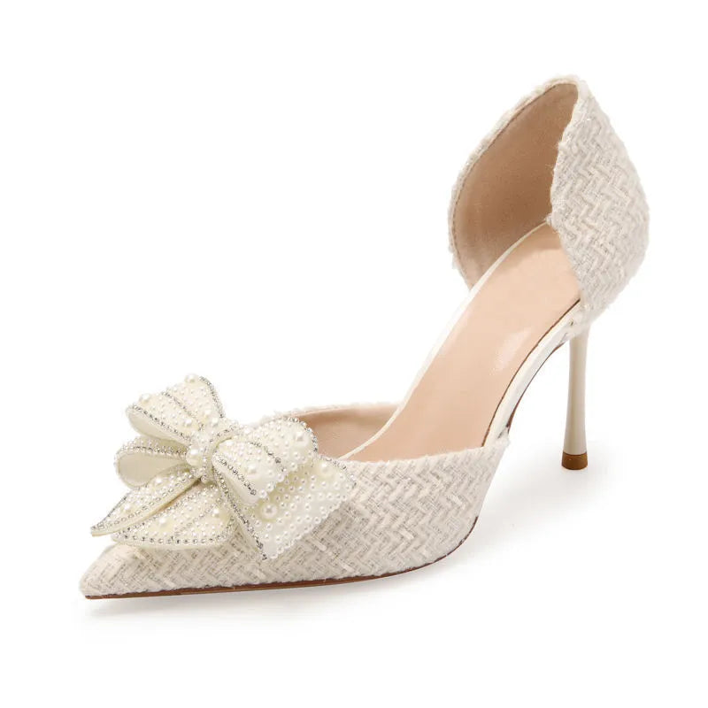 Women's pointed toe pumps with rhinestone bow, side cut-out and skirt detail, PU upper, beige