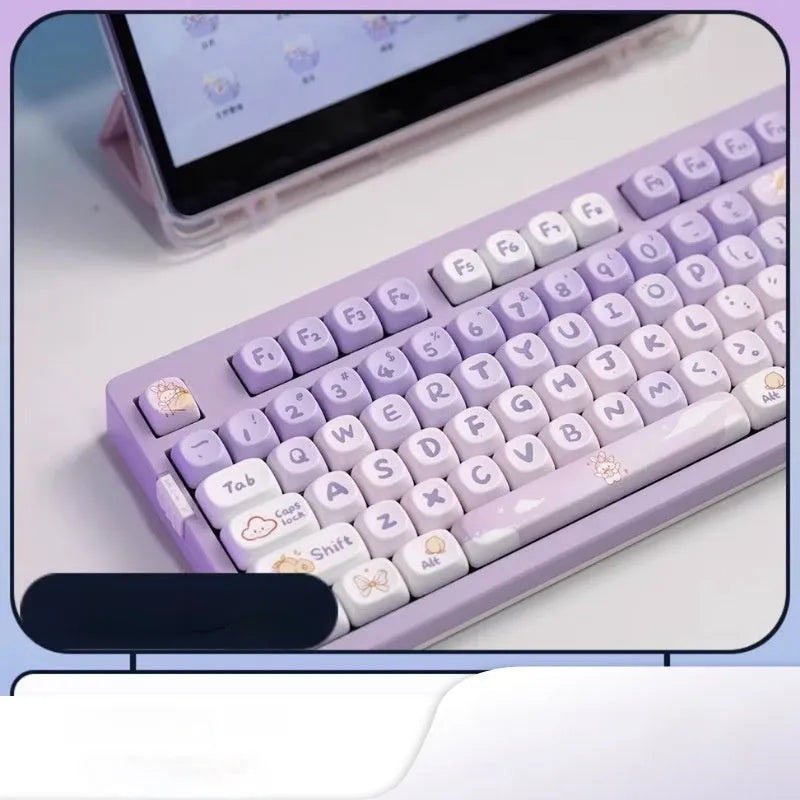 Set of purple gradient keycaps with rabbit design for mechanical keyboards.