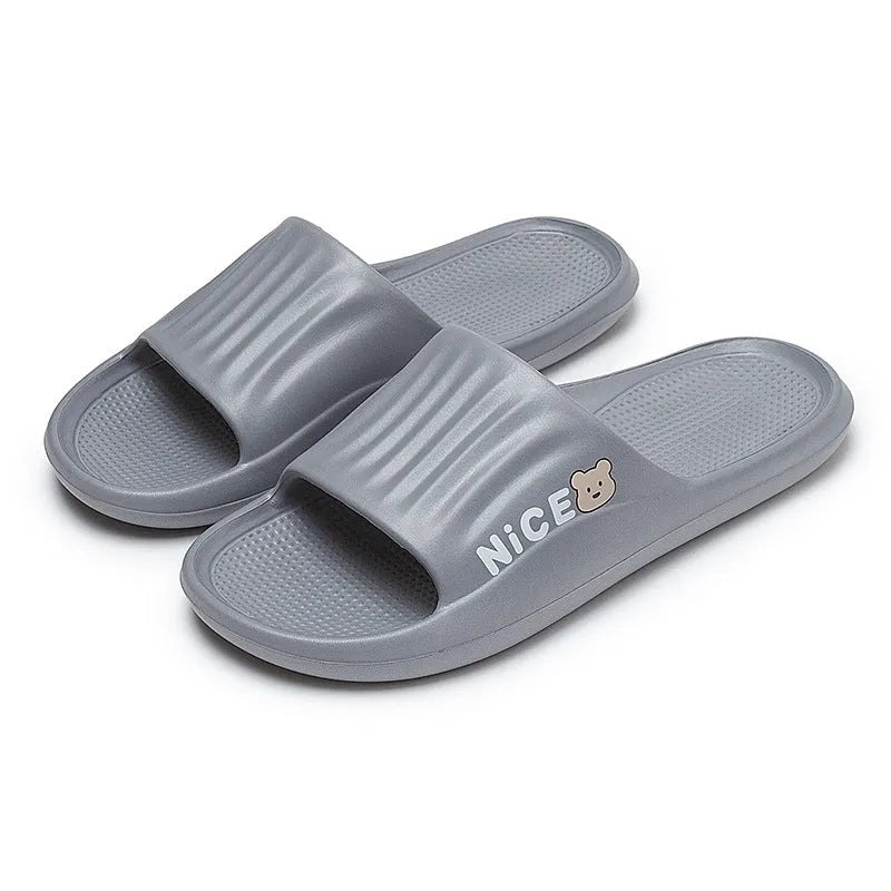 A pair of EVA flip flop slippers with a cartoon pattern, shown in one of six available colours.