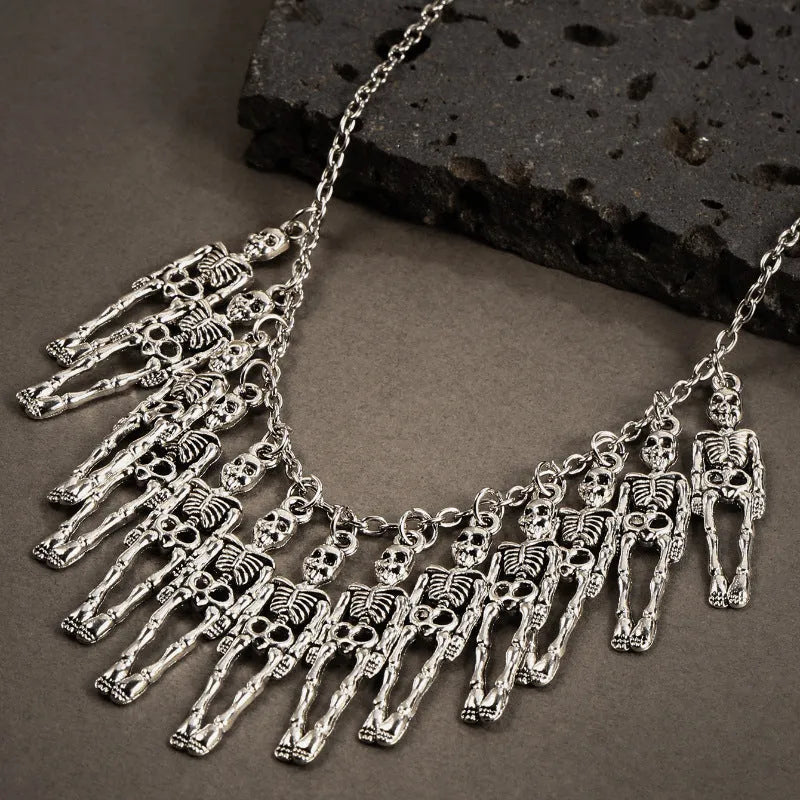 Dark style alloy skull and ghost claw necklace and earrings set for women with electroplated finish