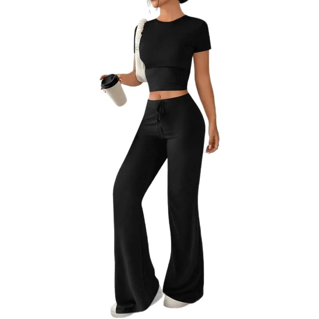 Women's black high waist trousers and short sleeve T-shirt two piece suit on hanger
