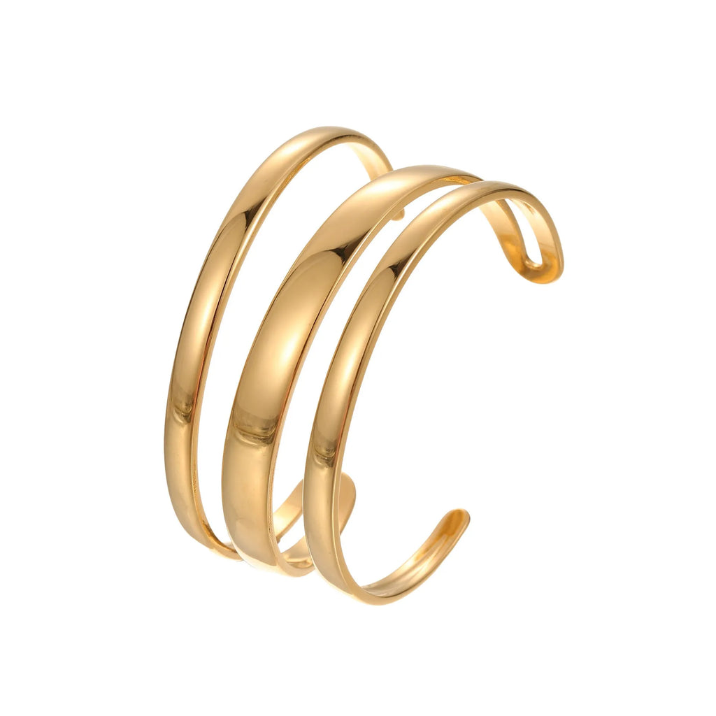 Women's stainless steel simple opening bracelet with geometric line design in gold or steel colour.