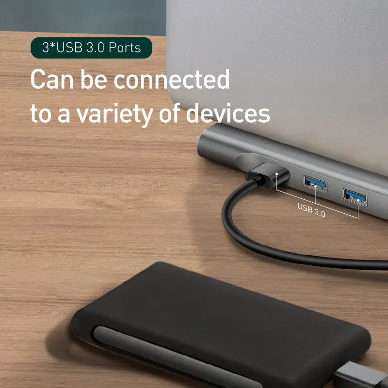 Grey aluminium alloy ten-port USB C docking station with cooling bracket showing HDMI, VGA and Ethernet ports