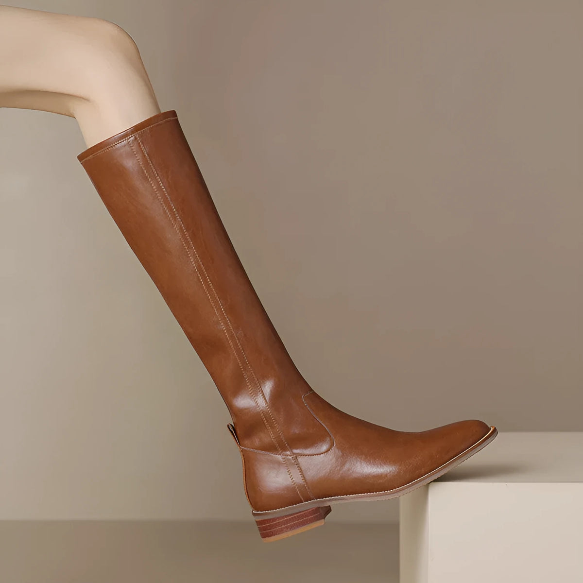 Women's black cowhide leather knee-high riding boots with chunky heel, round toe, and side zipper