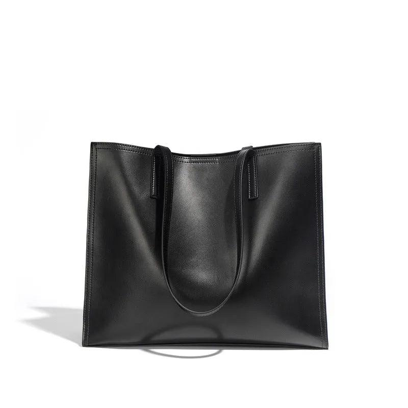 Brown genuine leather women's one shoulder handbag with a horizontal square shape.
