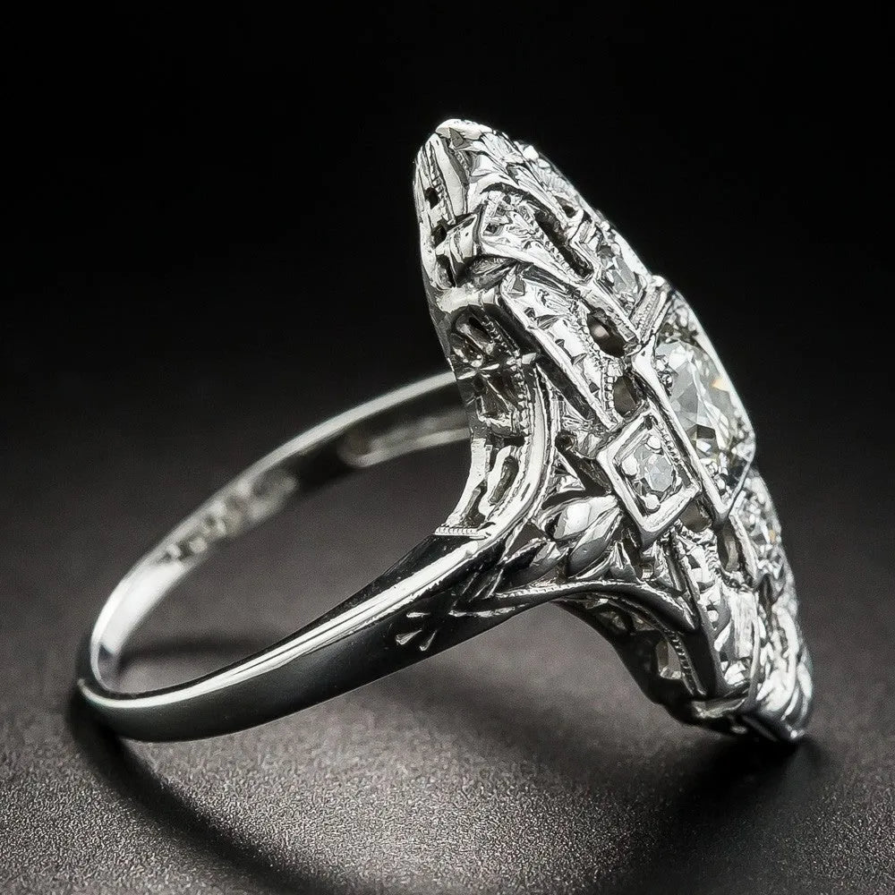 Geometric hollow out silver ring with diamond-studded details on copper construction