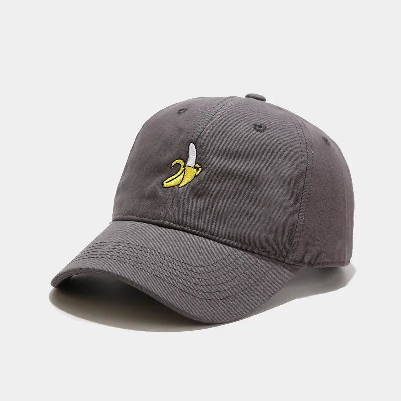 Adjustable baseball cap with cute banana embroidery in seven colour options on soft polyester fabric