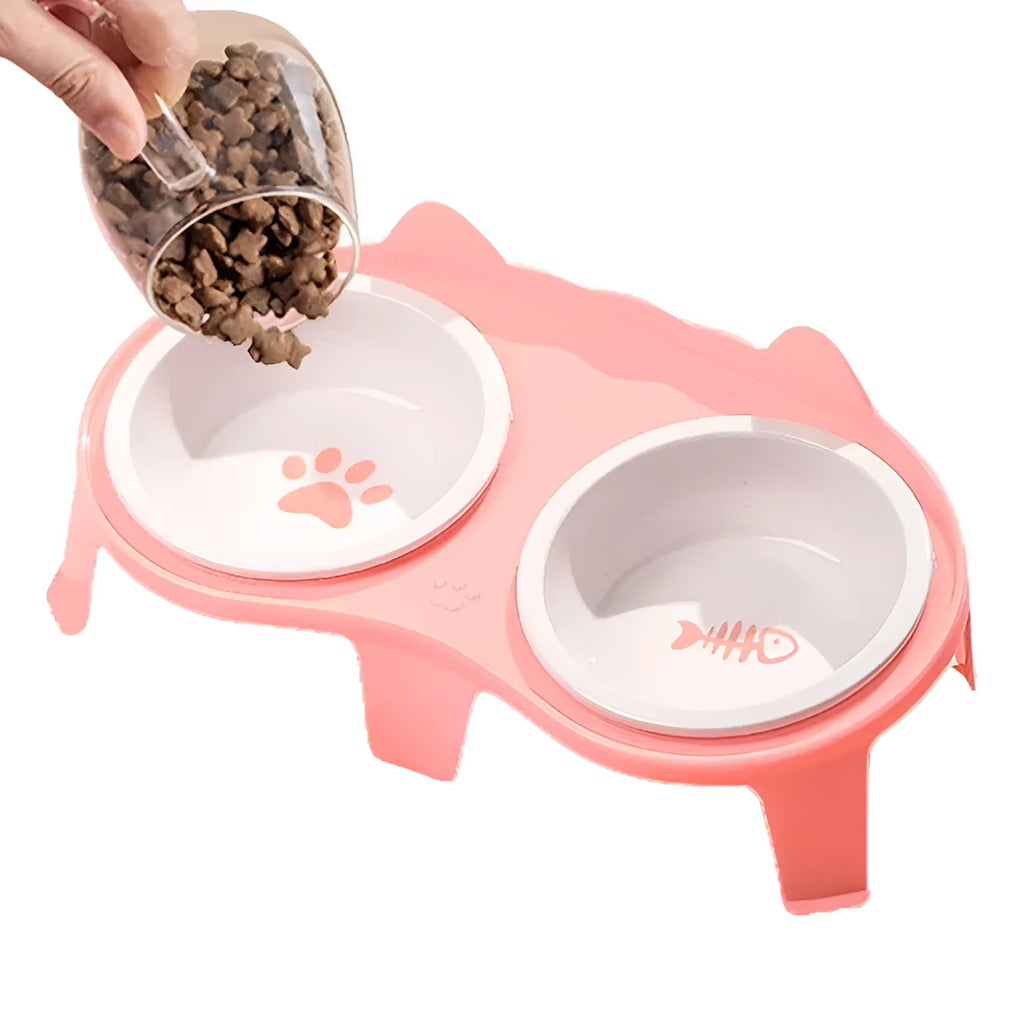 Blue ceramic cat food and water bowls on a white elevated plastic stand with a hook