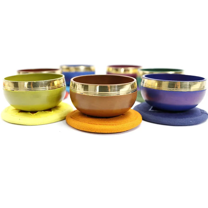 Handmade colourful Himalayan singing bowl percussion instrument measuring 7.8 cm for meditation and yoga.