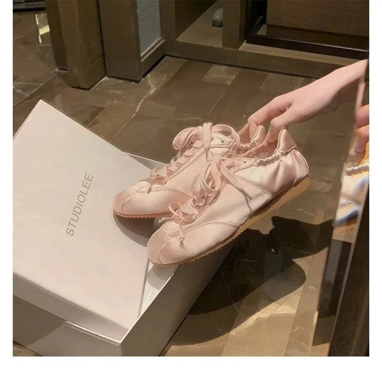 Women's ballet-style satin sports board shoes with round toe and front lace-up fastening in three colour options