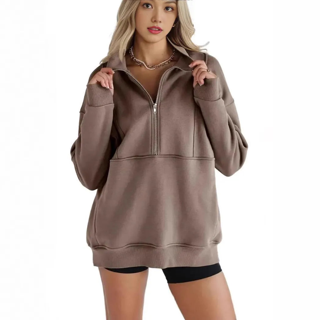 Women's loose polyester brushed hoody with zipper pocket in street hipster style, roomy fit, thick fabric