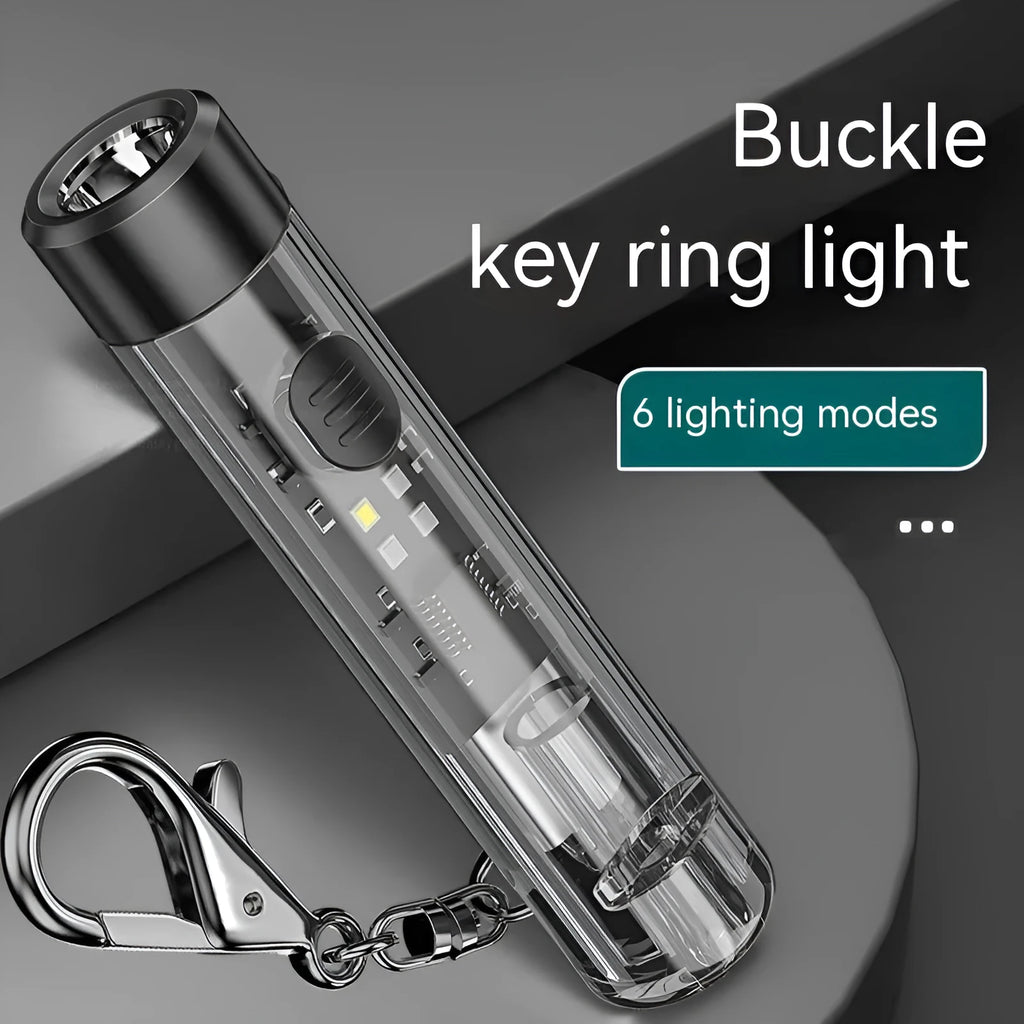 Black plastic USB rechargeable portable flashlight with charging cable.