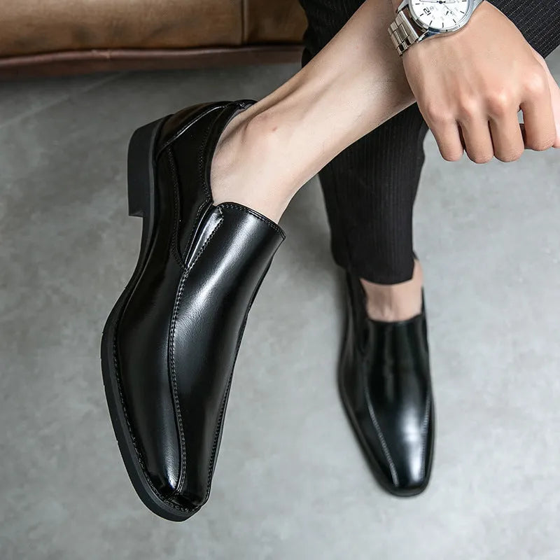 Men's black patent leather pointed toe casual shoes with a flat rubber sole