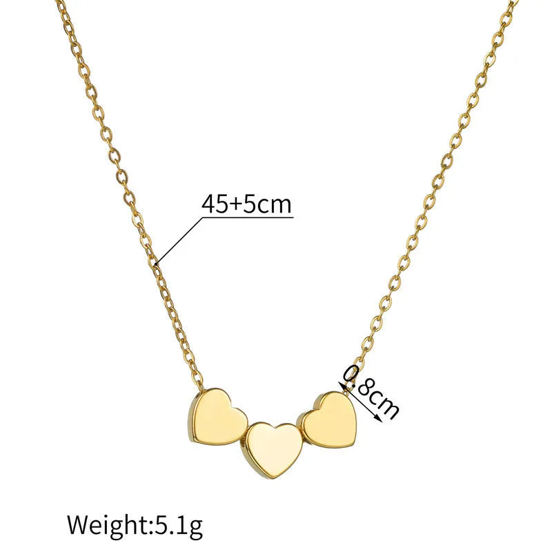 Gold stainless steel three-heart pendant necklace with laser-engraved black text on O-chain