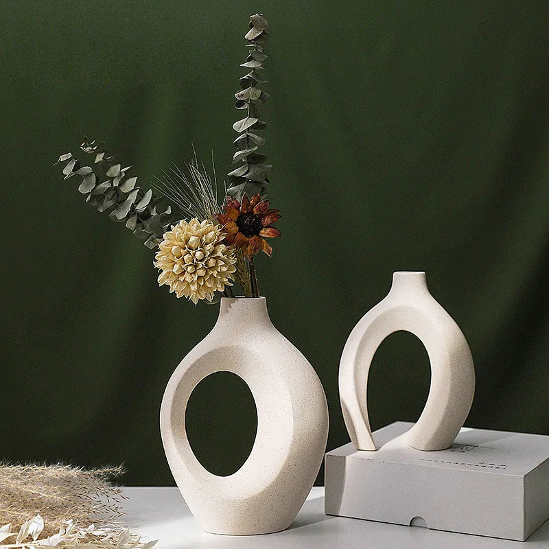 Two glazed ceramic vases in snuggle colour set for home decoration
