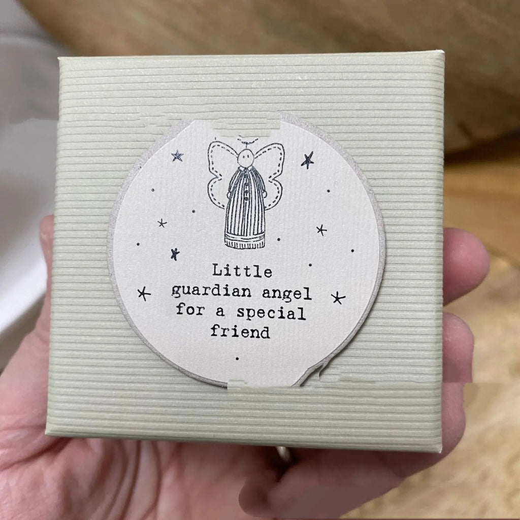 Boxed resin guardian angel ornament in modern simplicity cartoon style