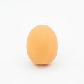 Natural rubber egg-shaped dog chew toy with a squeaker inside for dental play.