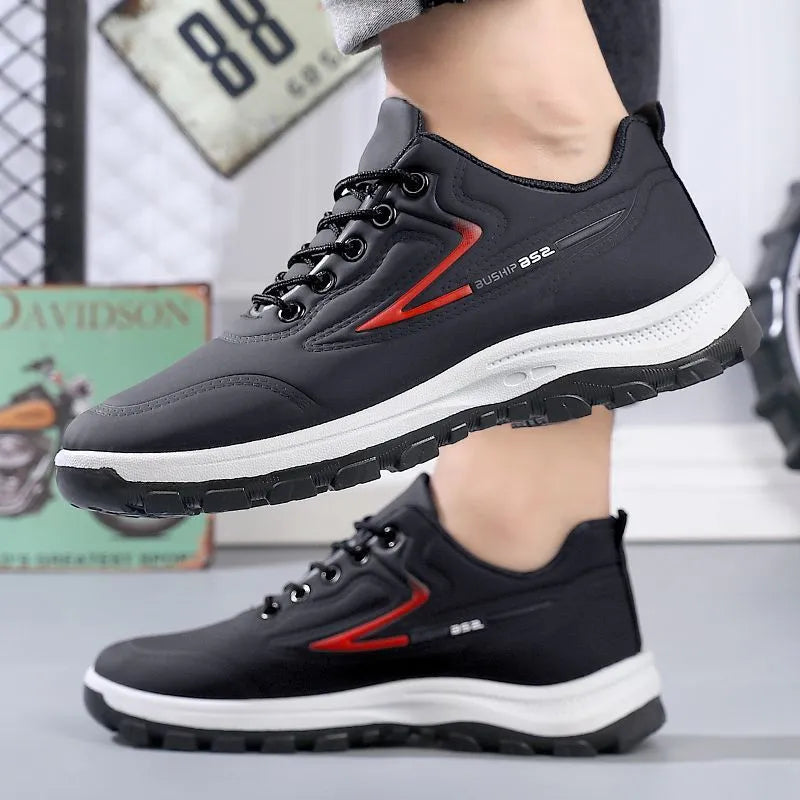 Black and grey waterproof leisure sports shoes with soft plastic soles and pointed-toe design
