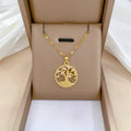 Gold-coloured adjustable necklace with a mother of pearl and rhinestone cross pendant on a lip chain.