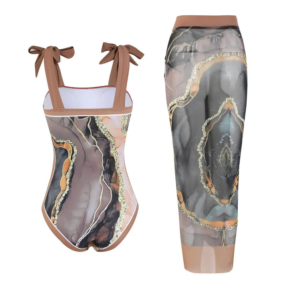 Floral pattern one-piece swimsuit with mesh tube top and matching skirt in brown print