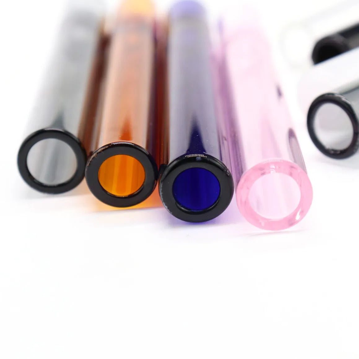 Telescopic straight glass smoke pipe with suction nozzle in transparent or pink finish