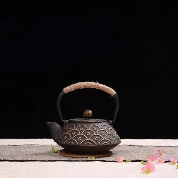 Japanese style cast iron teapot with fish pattern design in black finish for tea brewing