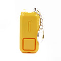 Compact pink personal safety alarm keyring with a button, shown next to its white retail box.