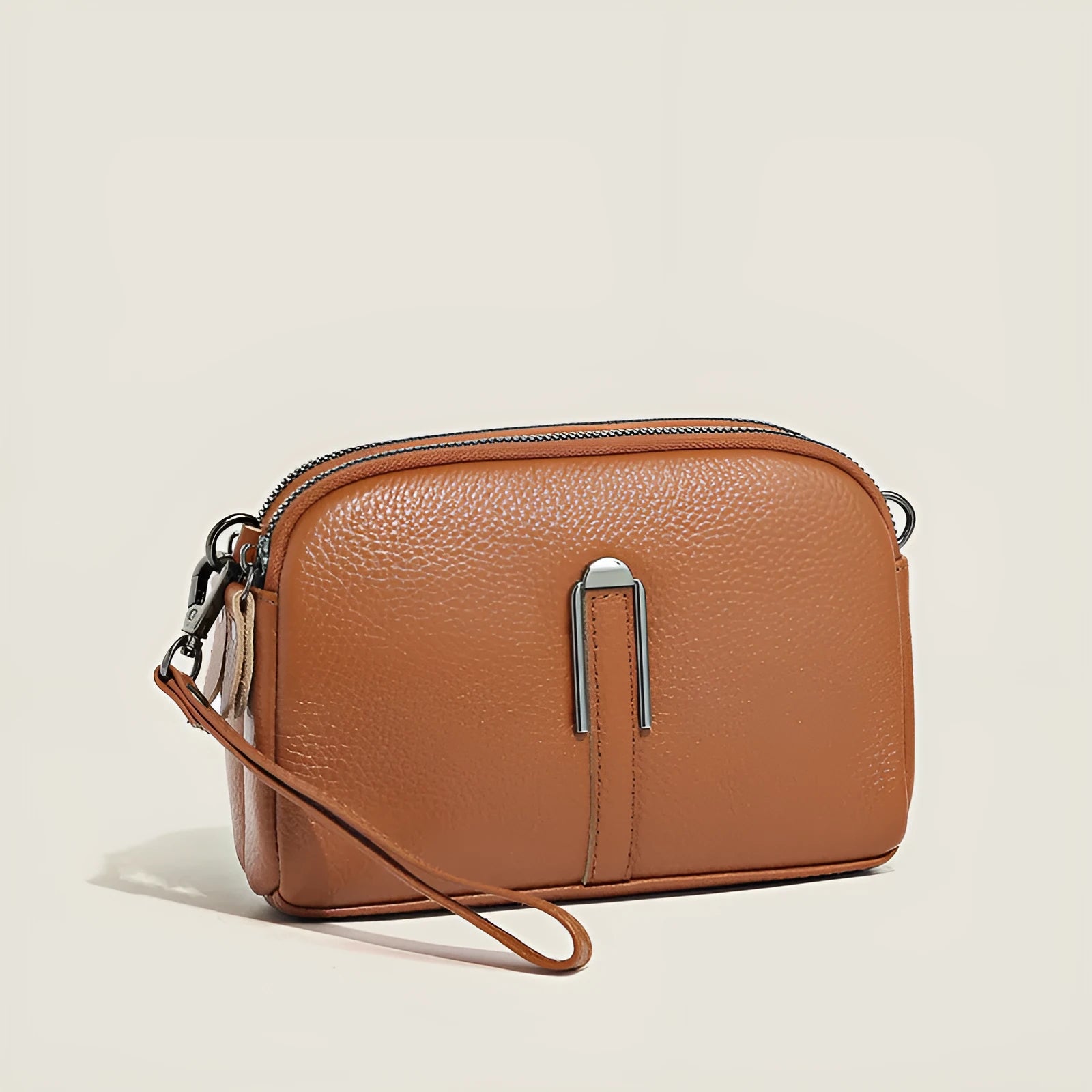 Minimalist crossbody bag in top-grain leather with spliced design, horizontal square shape, inner zippered pocket