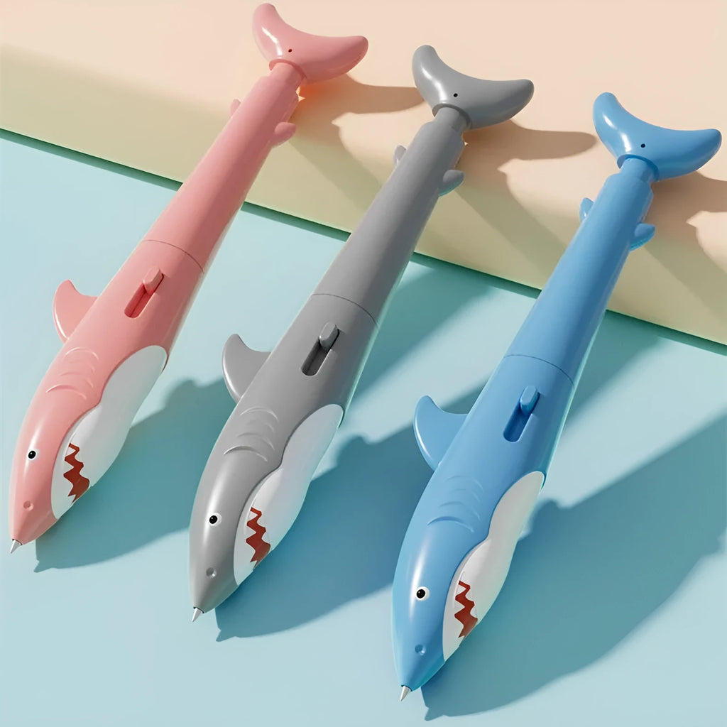 Shark water gun pen in blue plastic with press mechanism for water spray, on white background