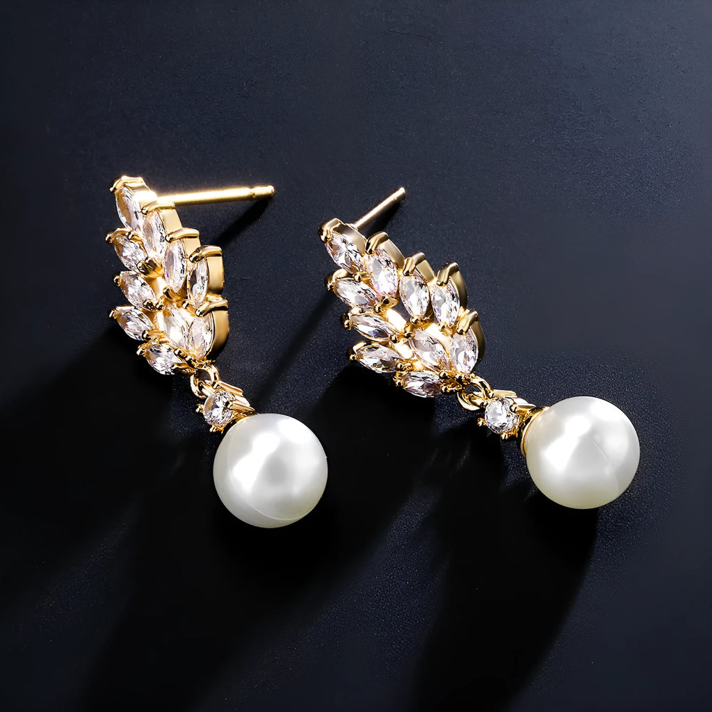 Geometric women's earrings with micro inlaid zircon stones and pearl accents in three metal colours