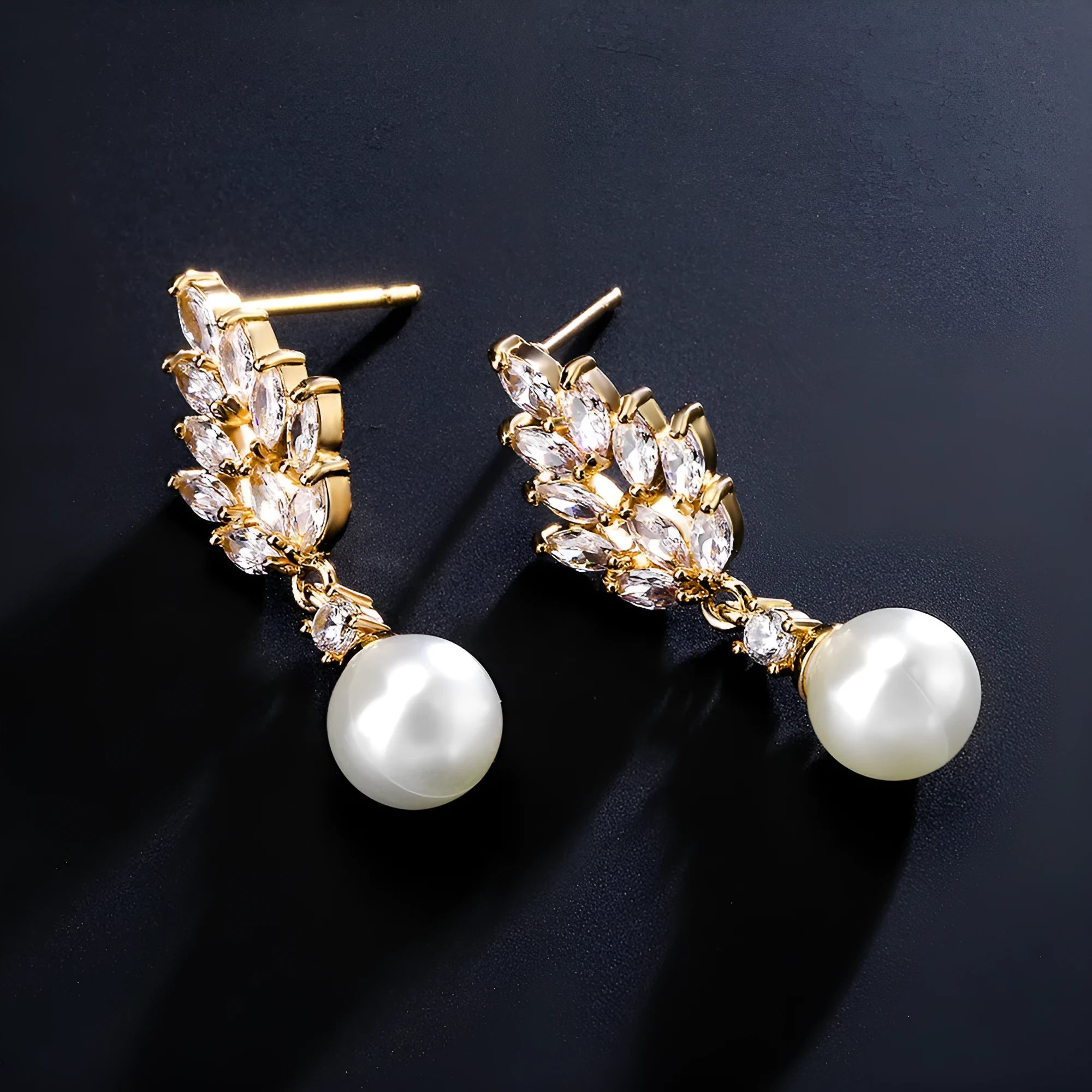 Geometric women's earrings with micro inlaid zircon stones and pearl accents in three metal colours