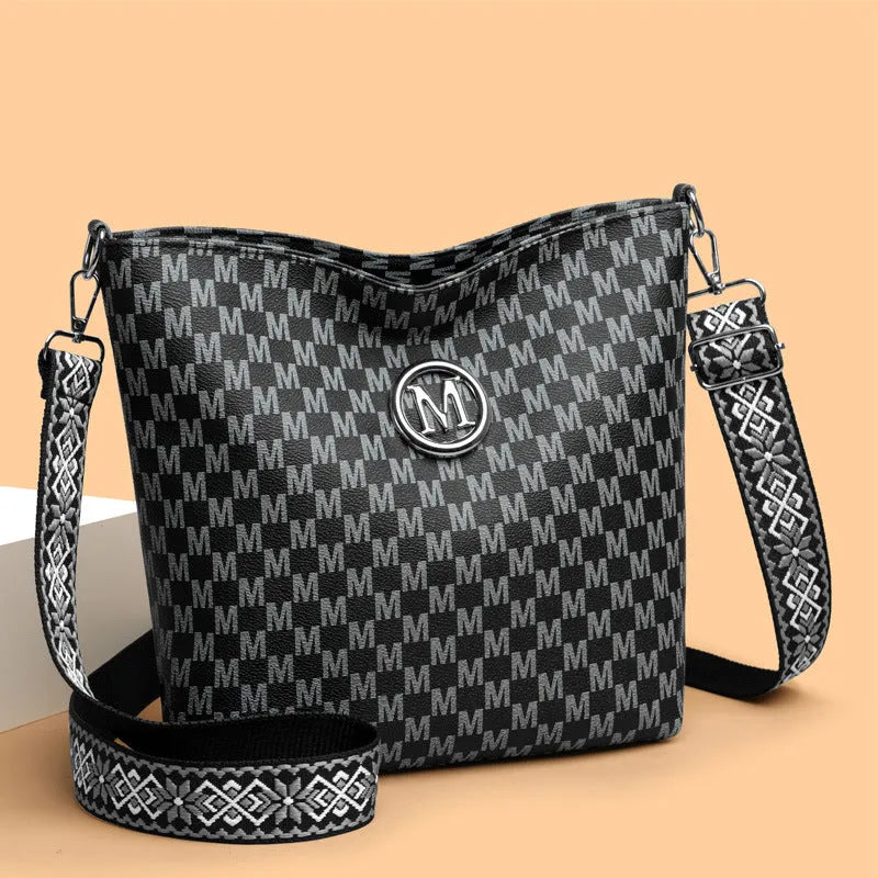 PU leather retro shoulder bag with dumpling shape design in black, brown or white colours