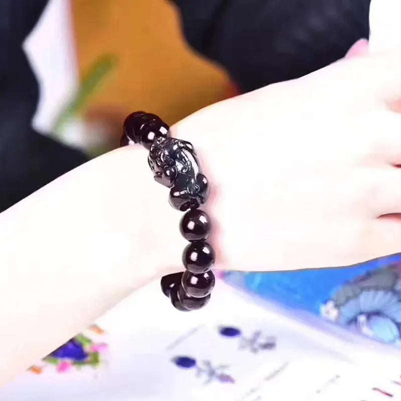 Natural ice colour eye obsidian bracelet showing crystal beads in five available sizes