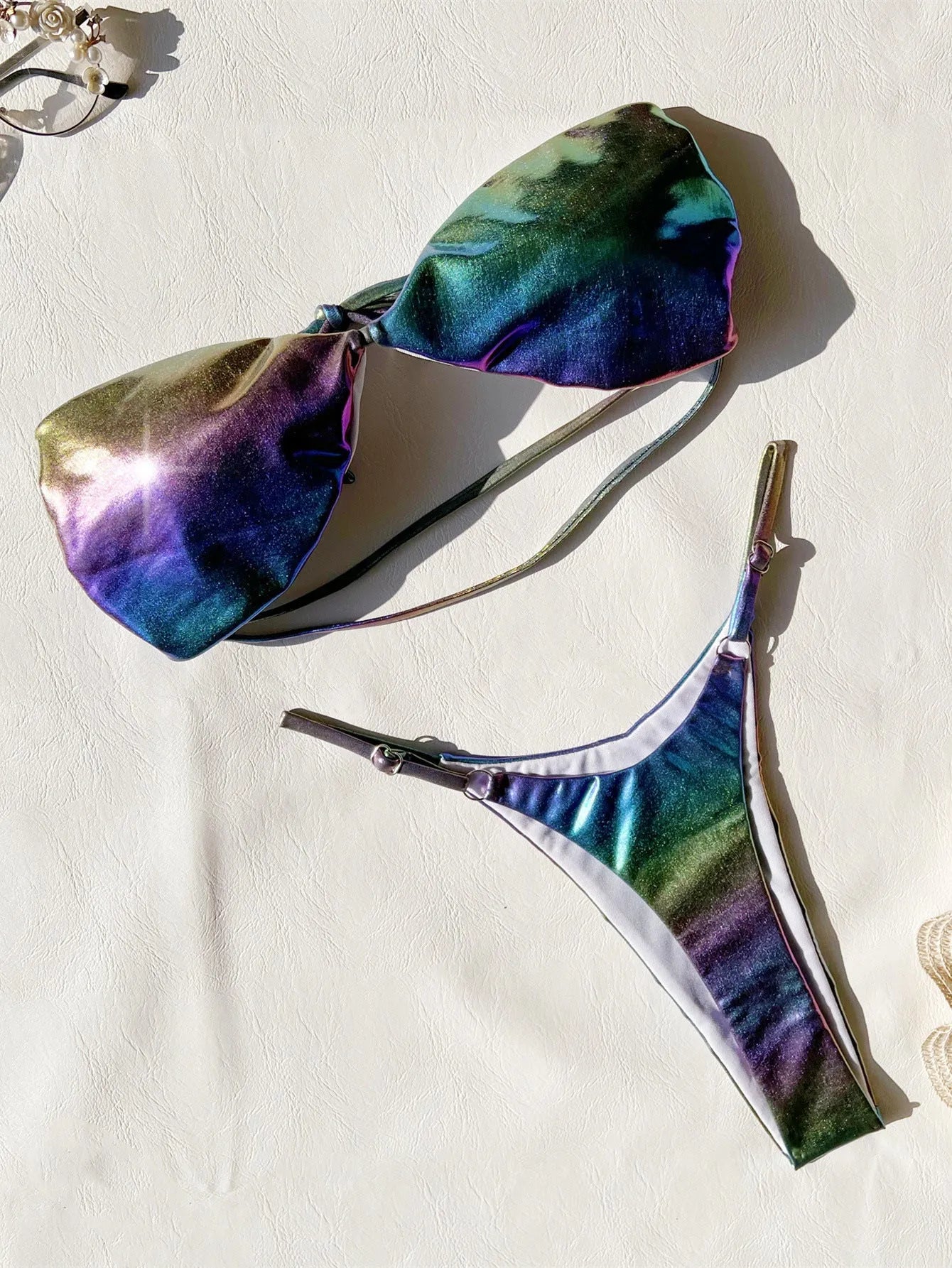 Women's gradient purple polyester bikini swimsuit set on a mannequin