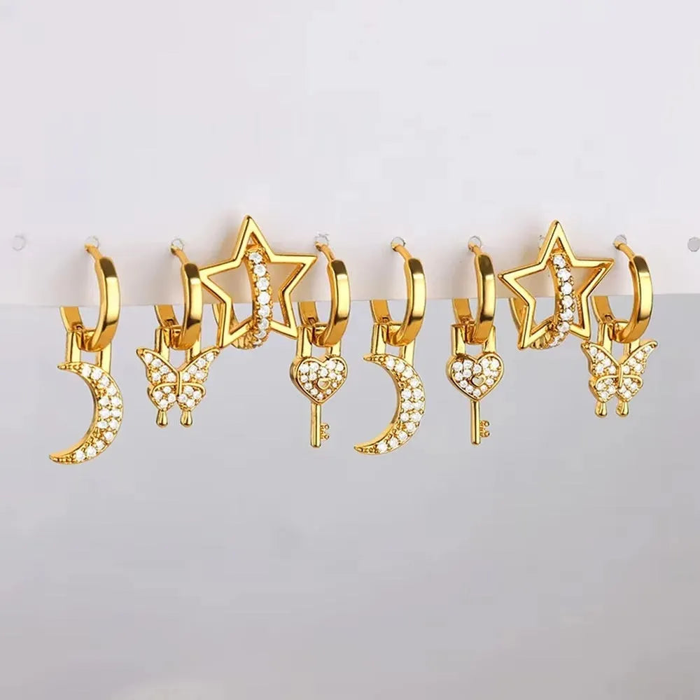 Women's copper butterfly earrings with heart and star geometric details in various colours.