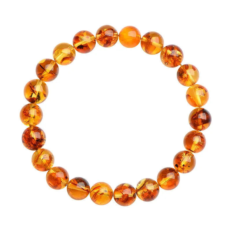 Natural yellow piebald amber bracelet with flower spot patterns and polished geometry beads