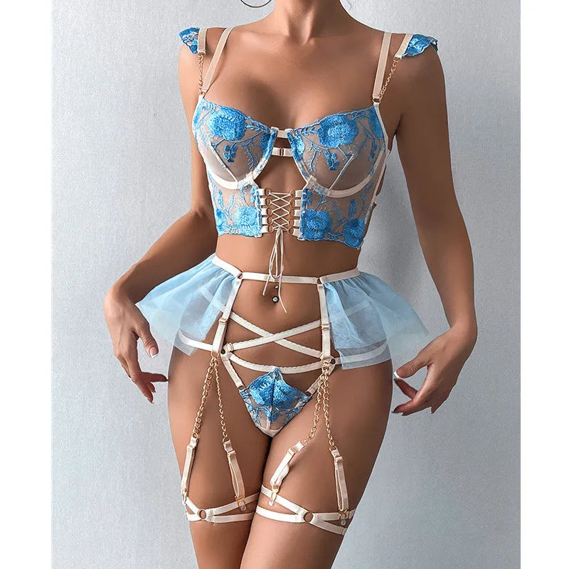 Light blue embroidered lace transparent push up bra and pants set on a mannequin.