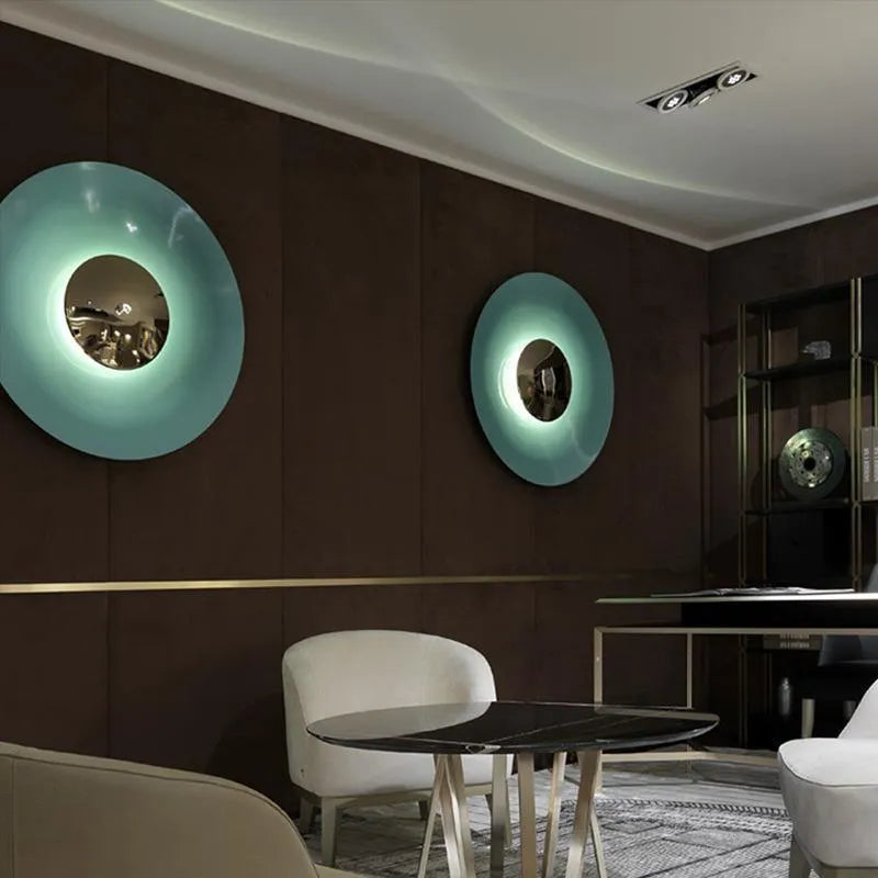 Circular UFO wall lamp in iron construction available in multiple sizes and colours
