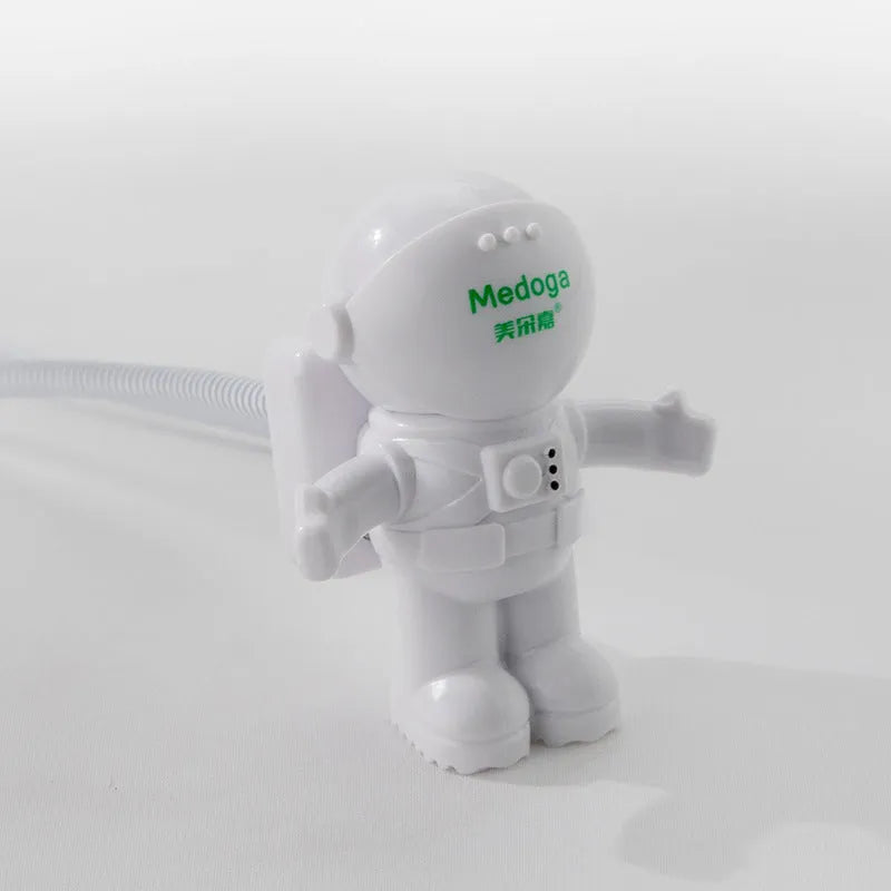 Mini astronaut USB night light hanging type in pink or green, 75 x 75 x 18mm with 2 metre cable