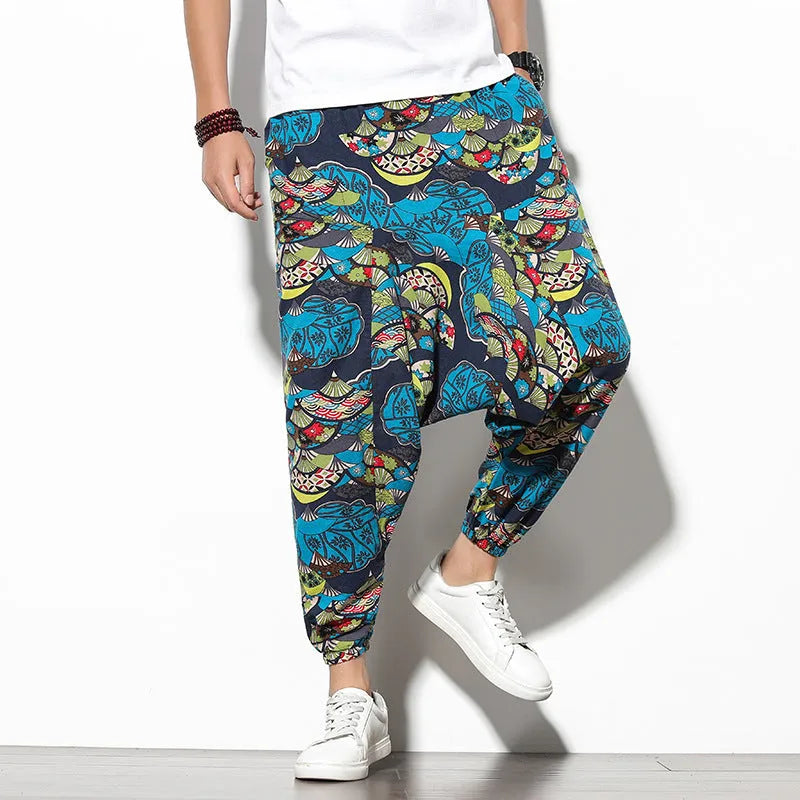Cotton wide-leg beach trousers with elephant flower print in blue fan colour, nine-point length, mid-waist