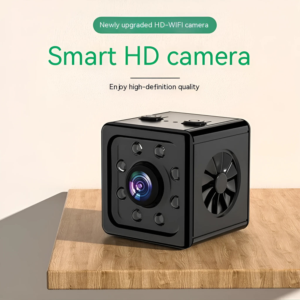Black cubic K13 remote network sports camera on a mounting bracket with data cable
